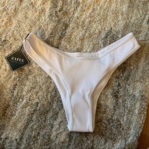 Brand new swim bottoms with tags size Medium